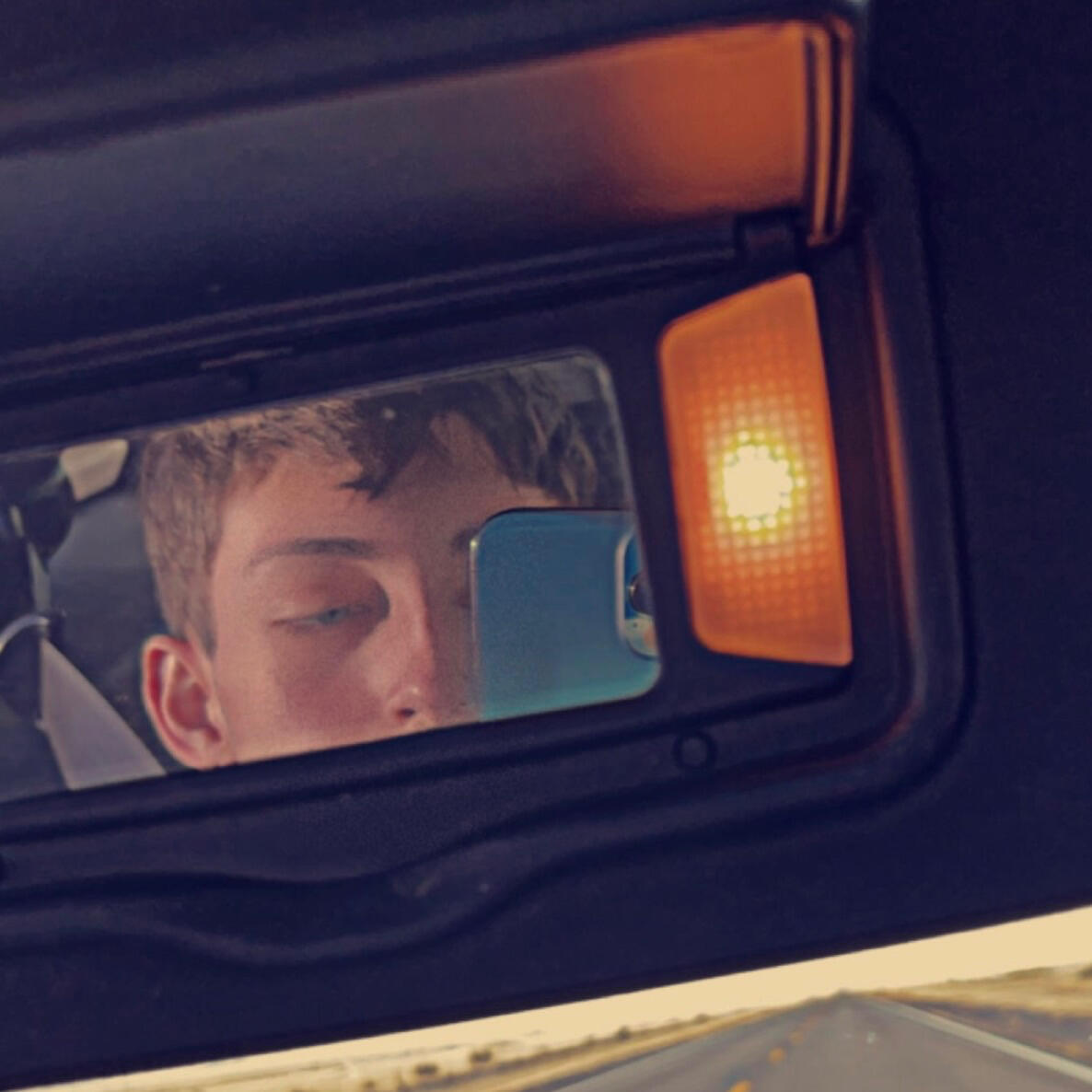 Car Mirror Selfie of Zackery Lightner